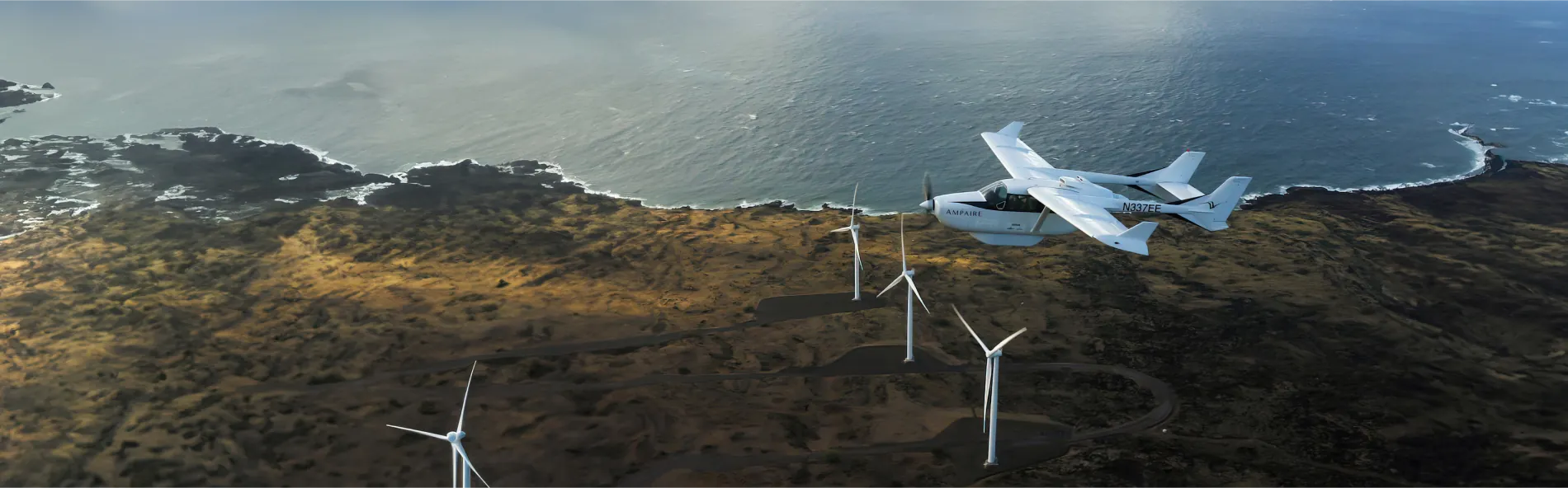 An airplane flies over a field of wind turbines. The photo is placed in a panoramic banner and extended to fill the entire banner using AI
