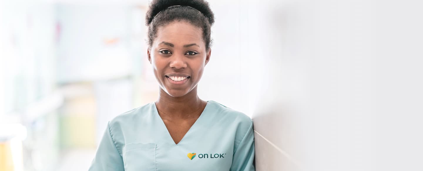 Photo of nurse with OnLok branded scrubs